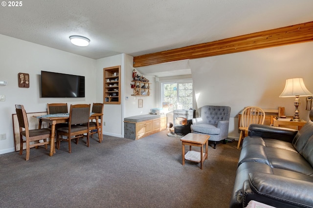 carpeted living room with a textured ceiling