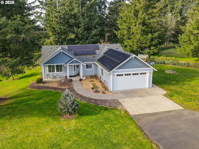 craftsman-style home featuring a garage, a front lawn, and solar panels