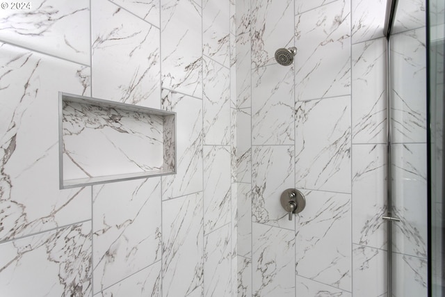 room details with a tile shower