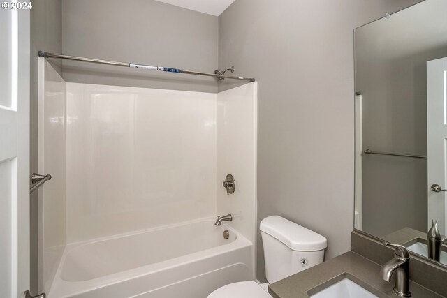 full bathroom with sink, toilet, and shower / tub combination