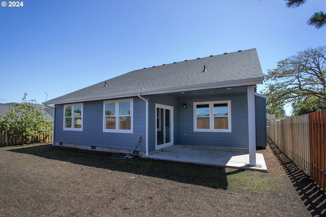 back of property featuring a patio area