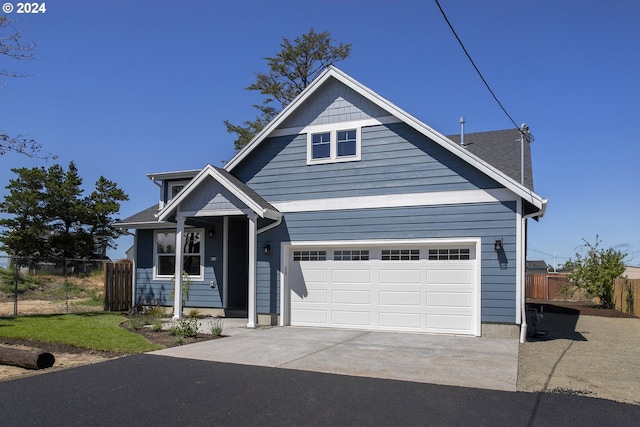 view of front of property featuring a garage