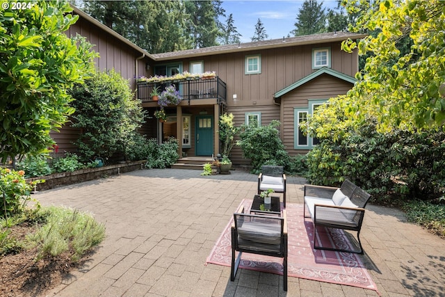 exterior space featuring an outdoor hangout area