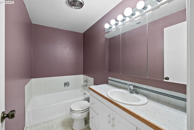 bathroom with a tub to relax in, vanity, and toilet