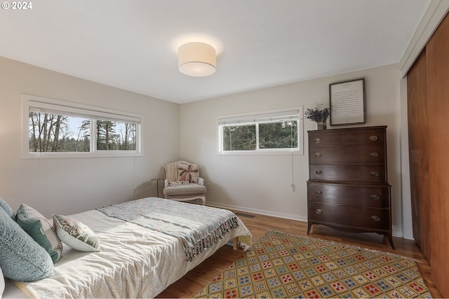 bedroom featuring hardwood / wood-style flooring