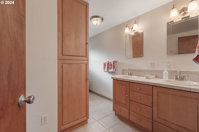 bathroom with vanity and tile patterned floors