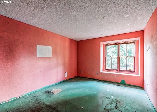 1730 SW 203rd Ave, Beaverton, OR 97003 - unfurnished room with a textured ceiling