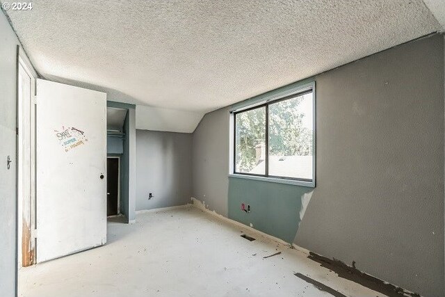1730 SW 203rd Ave, Beaverton, OR 97003 - unfurnished bedroom featuring a textured ceiling