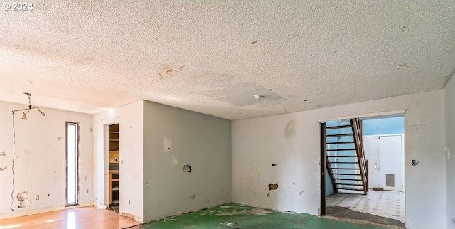 1730 SW 203rd Ave, Beaverton, OR 97003 - unfurnished room with a textured ceiling and healthy amount of natural light