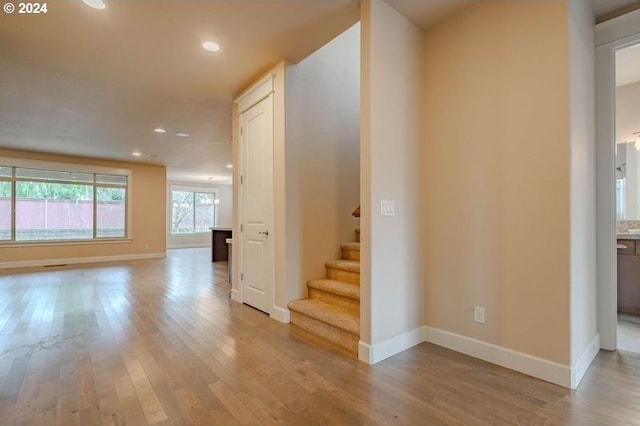 stairway featuring hardwood / wood-style floors