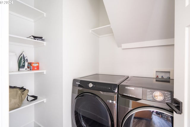 laundry area with washer hookup and washing machine and dryer