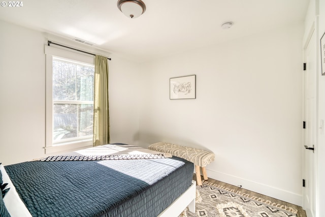 bedroom featuring hardwood / wood-style floors