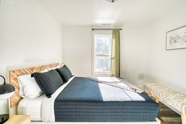 bedroom with wood-type flooring