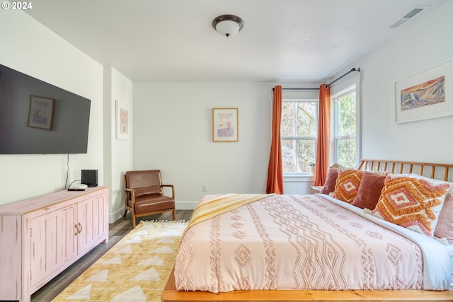 bedroom featuring hardwood / wood-style flooring