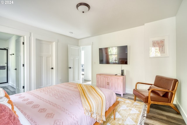 bedroom featuring hardwood / wood-style flooring