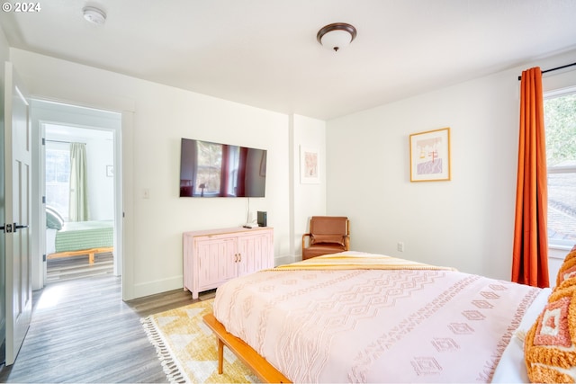 bedroom featuring hardwood / wood-style flooring