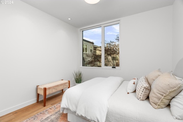 bedroom featuring wood-type flooring