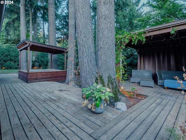 wooden deck featuring an outdoor living space