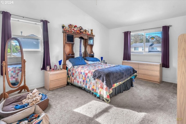 bedroom with light colored carpet and vaulted ceiling