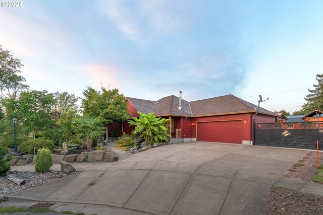 view of front of property with a garage