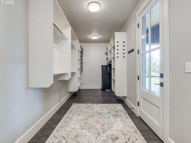 21625 Butteville Rd, Aurora, OR 97002 - kitchen featuring stainless steel appliances, a wood ceiling with exposed beams, white cabinets, dark wood-style floors, and a kitchen island