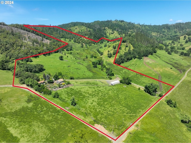 1262 Kester Rd, Roseburg, OR 97470 - view of rural area with property boundaries highlighted and a heavily wooded area