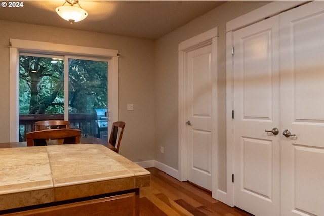 dining room with hardwood / wood-style floors