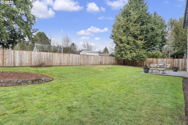 view of yard featuring a deck