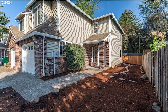 exterior space with a garage