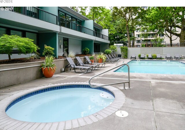 view of swimming pool featuring a patio