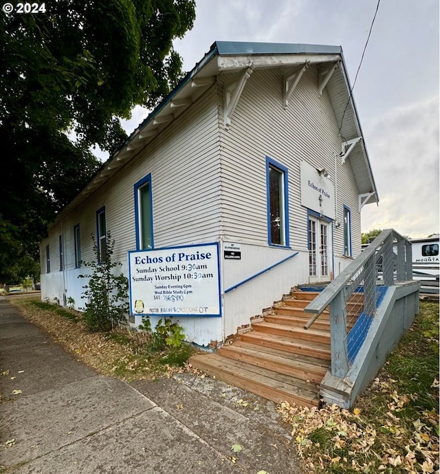 view of side of home with french doors