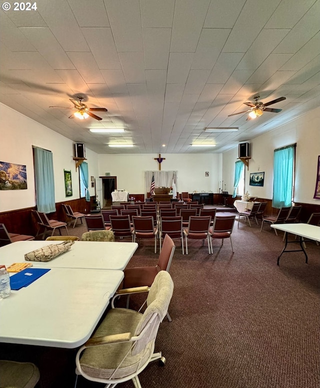 1520 X Ave, La Grande, OR 97850 - dining space featuring ceiling fan and dark colored carpet