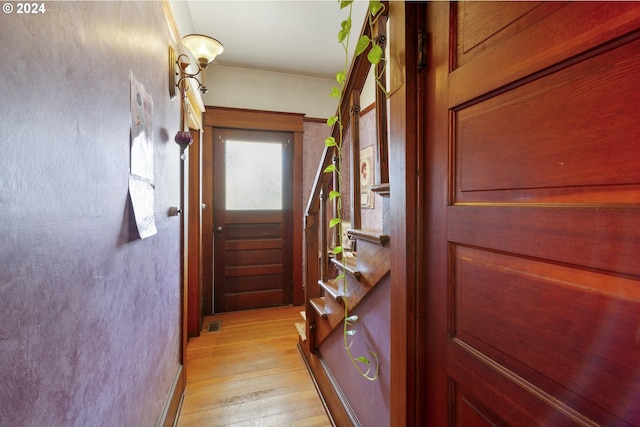 doorway featuring light hardwood / wood-style floors