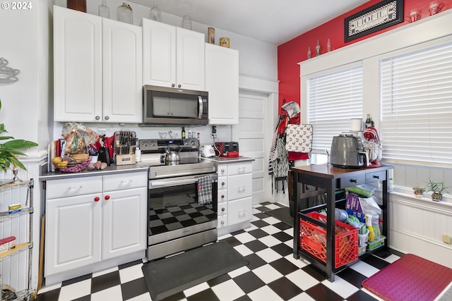 kitchen featuring white cabinets and stainless steel appliances