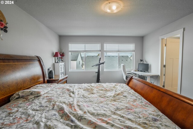 bedroom with a textured ceiling