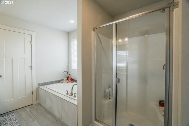 bathroom with independent shower and bath