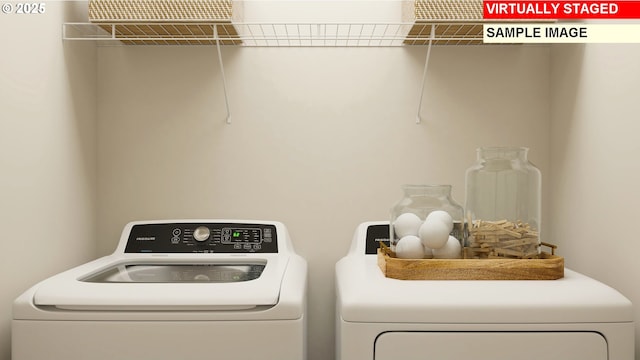 laundry area with washer and dryer