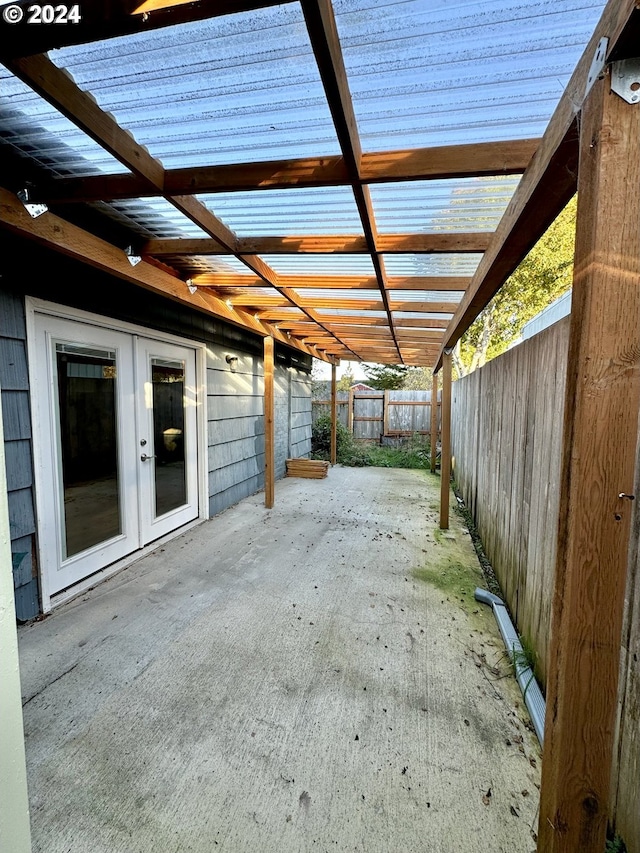 view of patio / terrace with french doors and a fenced backyard