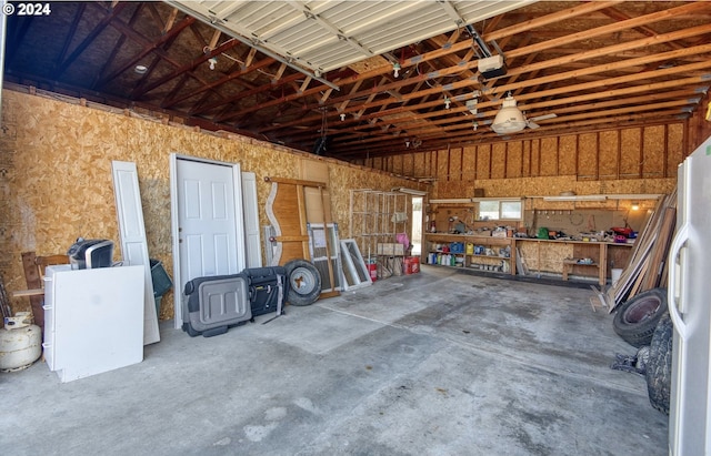 garage featuring white refrigerator