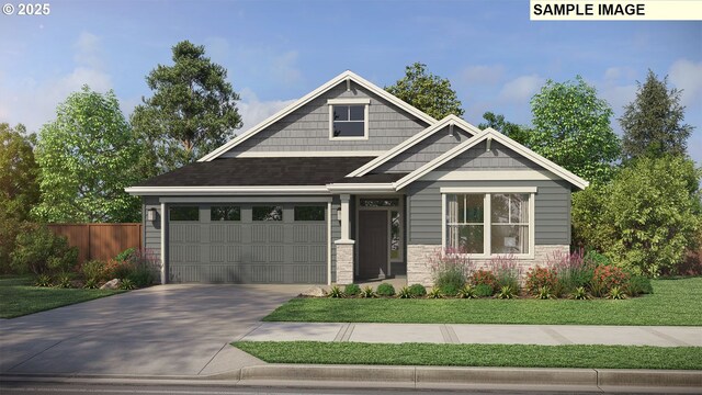 view of front of home with a garage and a front lawn