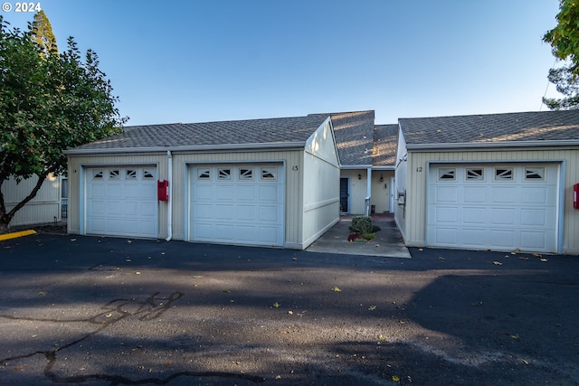 ranch-style house featuring a garage