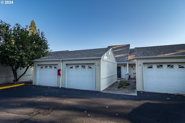 single story home featuring a garage