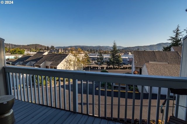 wooden terrace featuring a mountain view