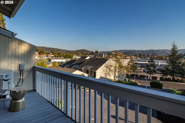 balcony featuring a mountain view