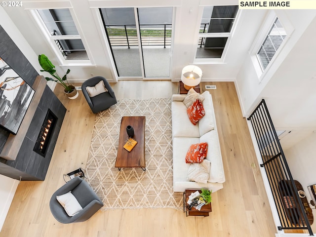 carpeted bedroom with multiple windows