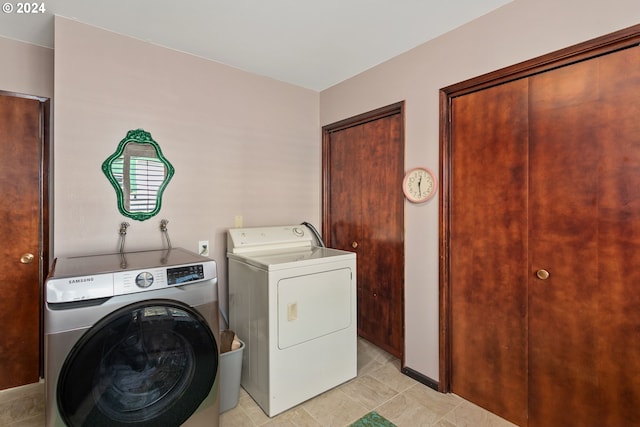 laundry area with washer and dryer