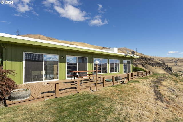 rear view of house with a mountain view