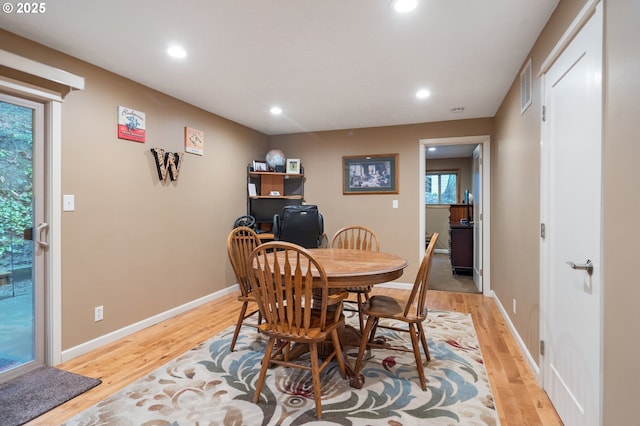 dining area featuring light hardwood / wood-style floors