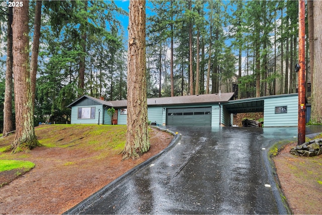 single story home with a carport