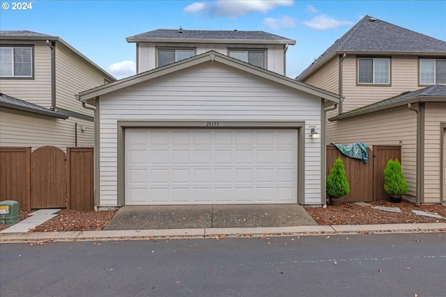 view of property featuring a garage